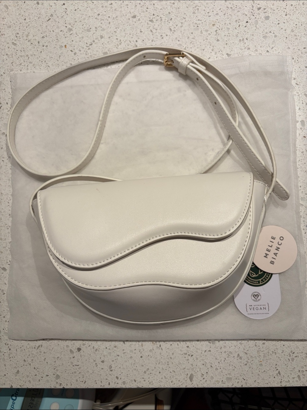Melie Bianco White Curved Flap Crossbody Bag